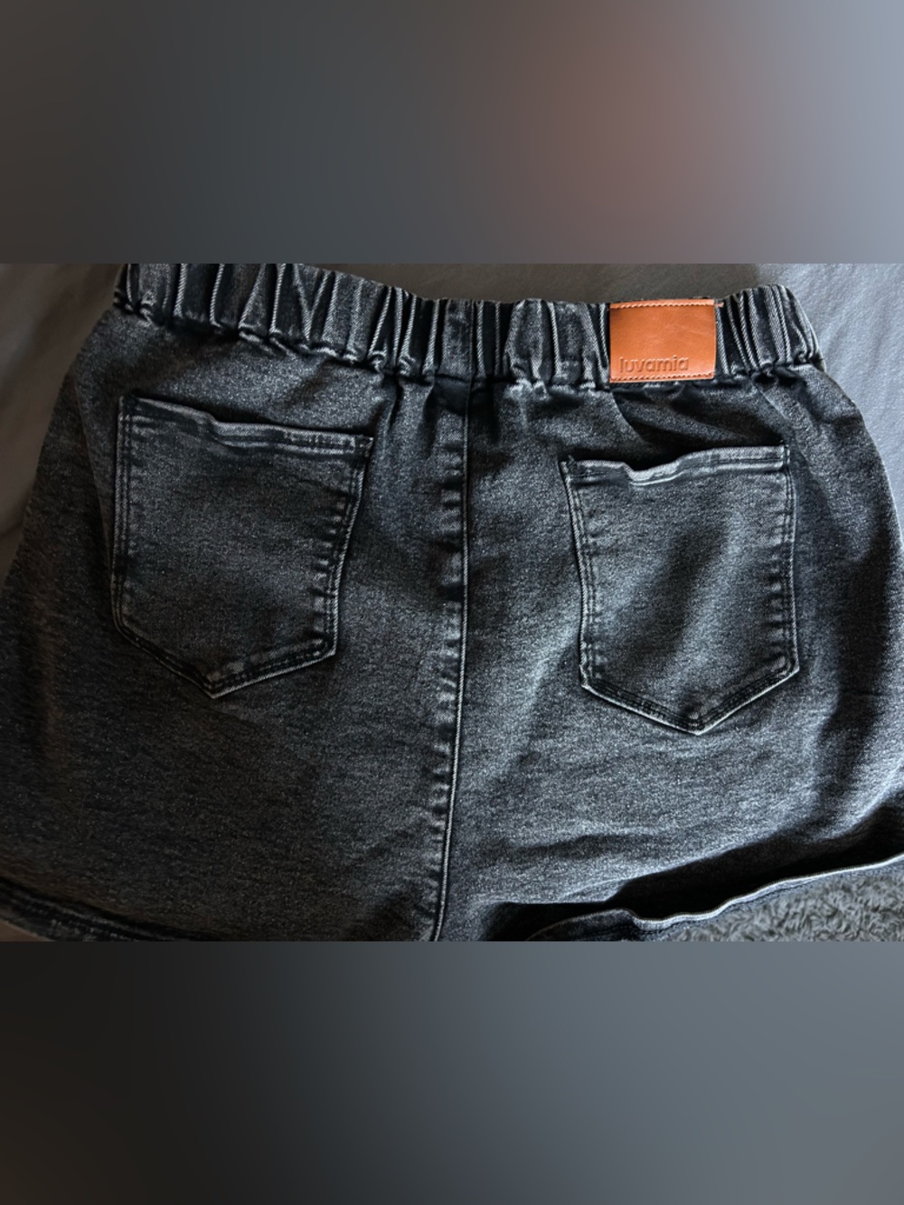 Black Jean shorts/skirt.
